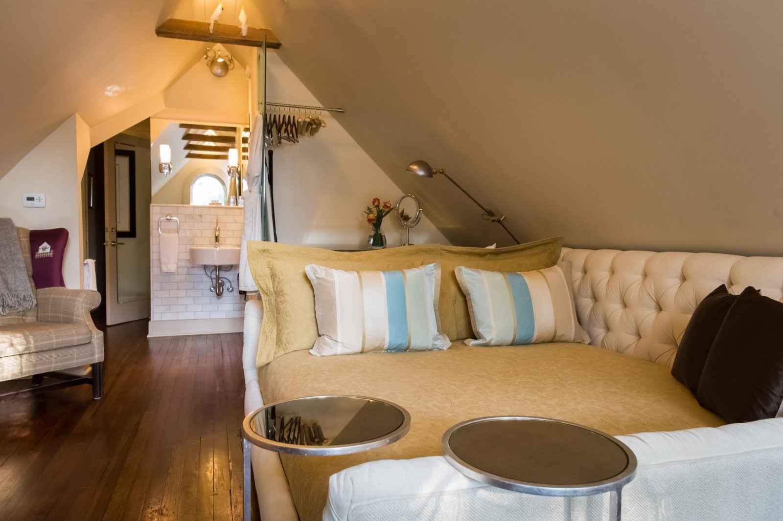 The bed inside The Eaves Room at Stonehurst Place