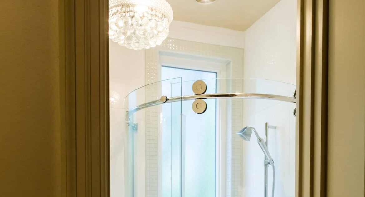 Piedmont room glass walk-in shower with chandelier in Stonehurst Place