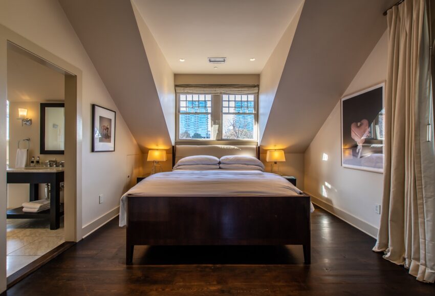 Master Suite bed with windows overlooking Atlanta