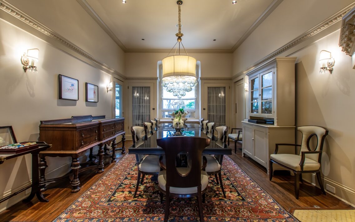 Stonehurst Place dining area with large chandelier in the center