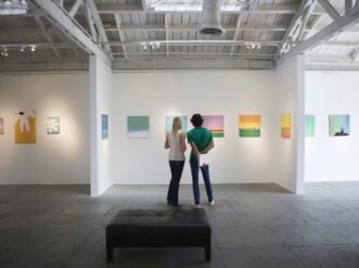 Couple exploring one of the Midtown Atlanta art galleries