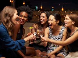 Group of women enjoying a night out at a Midtown Atlanta bar