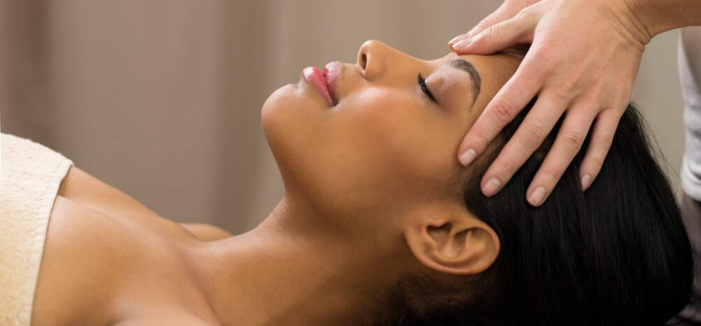A young woman getting a massage at a Midtown Atlanta spa